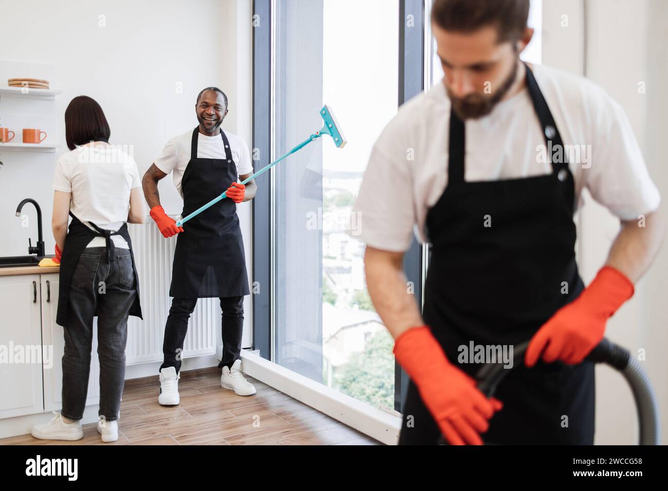 Black male cleaning glass hi-res stock photography and images - Alamy
