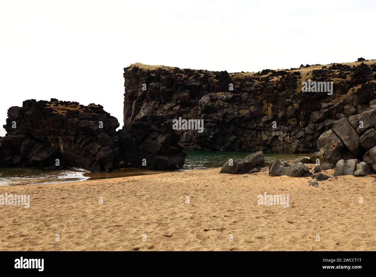 Skarðsvík is a tiny and charming beach with huge basaltic rock ...
