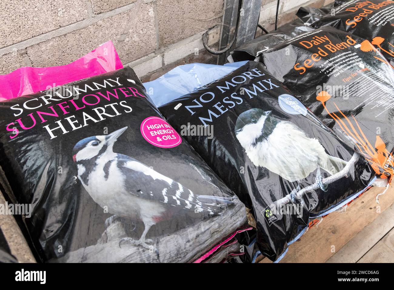 Garden bird food on sale in large sacks, Wales, UK Stock Photo