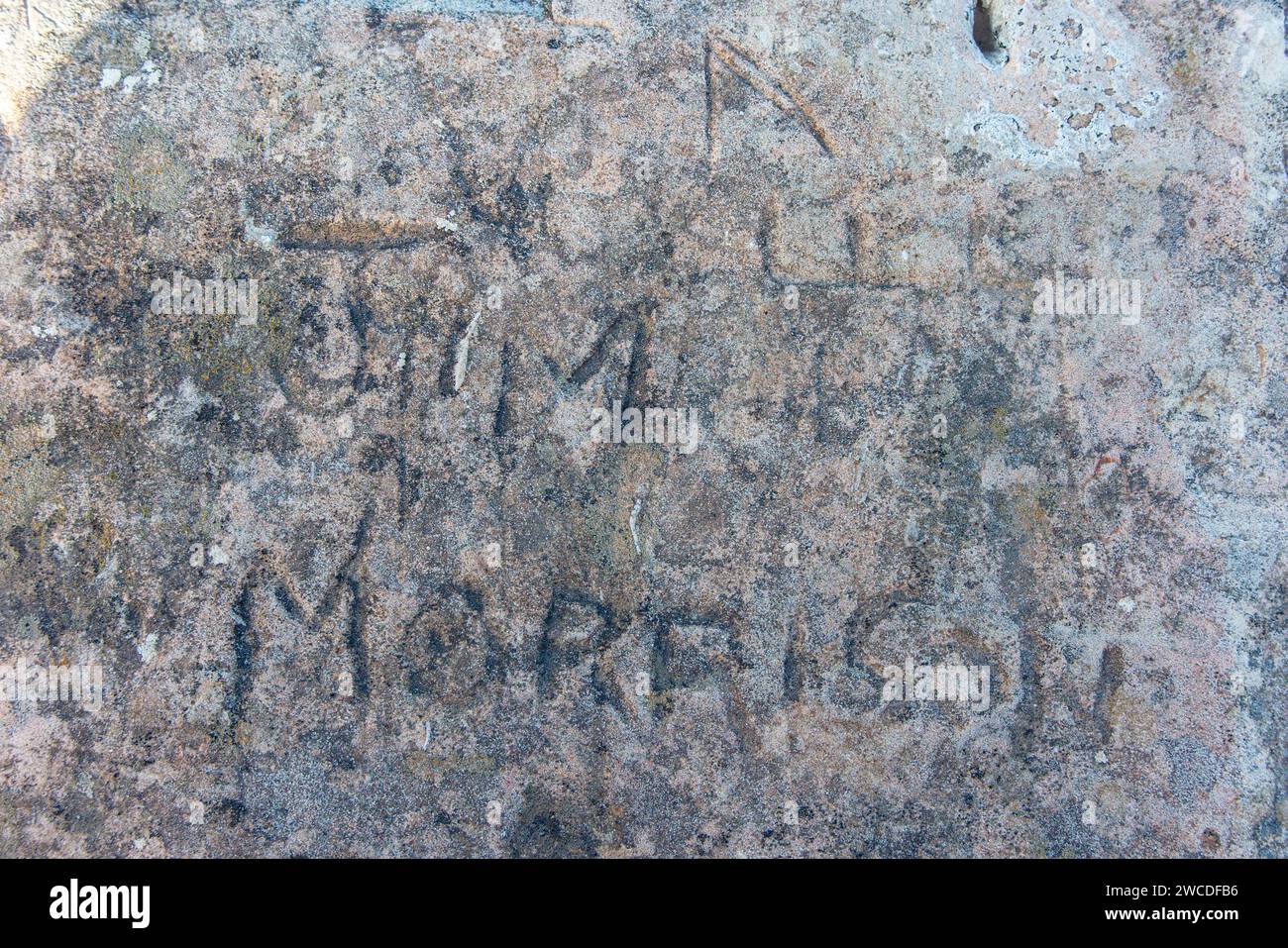 Jim Morrison's name engraved into an ancient wall in Malta Stock Photo