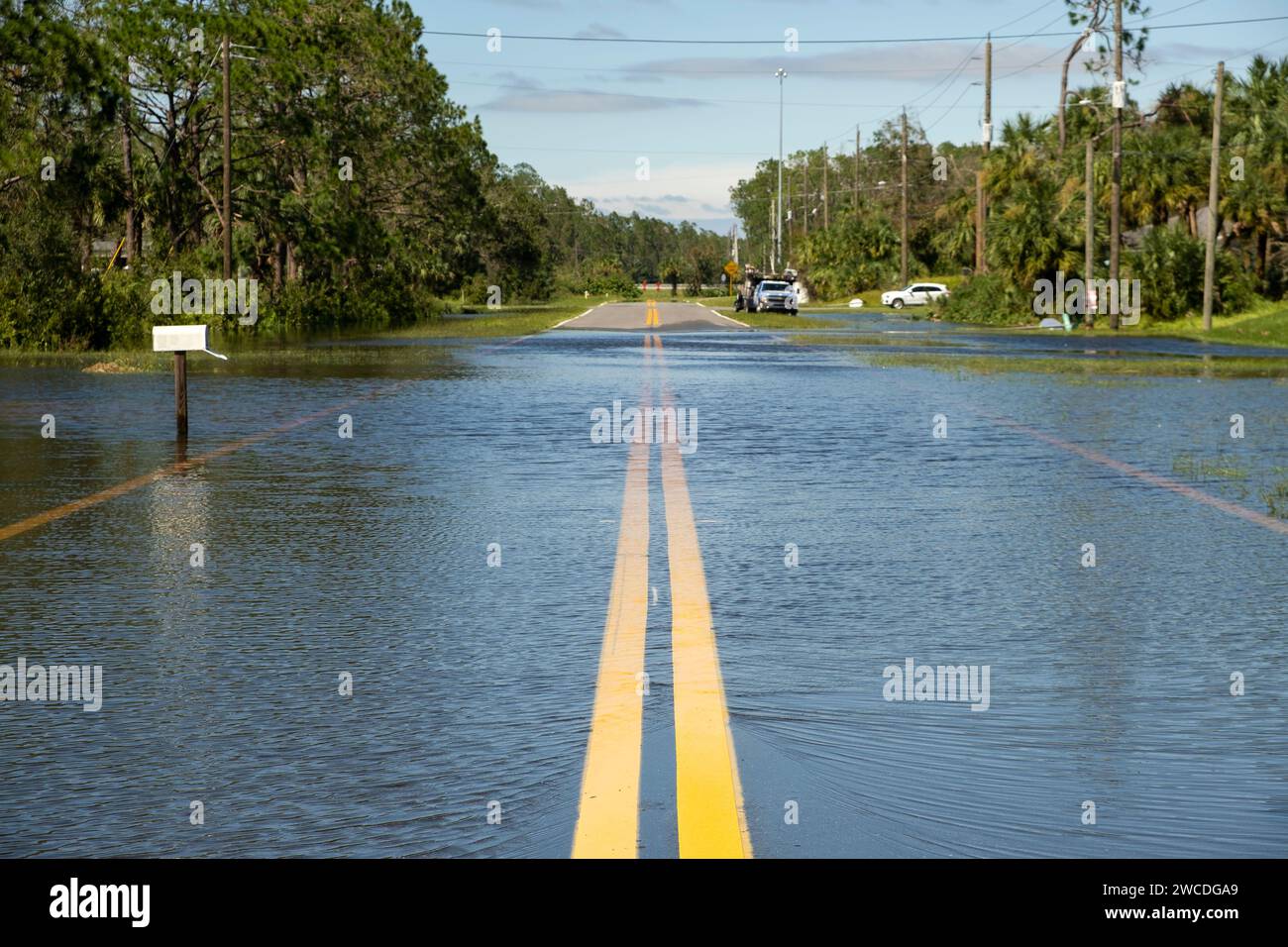 Flooded empty street after hurricane rainfall in Florida residential ...