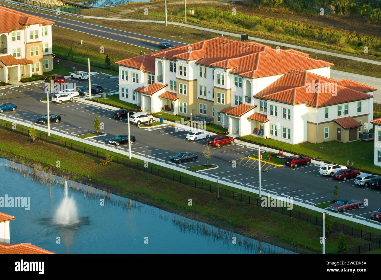 Top view of new apartment condos in Florida suburban area. Family ...