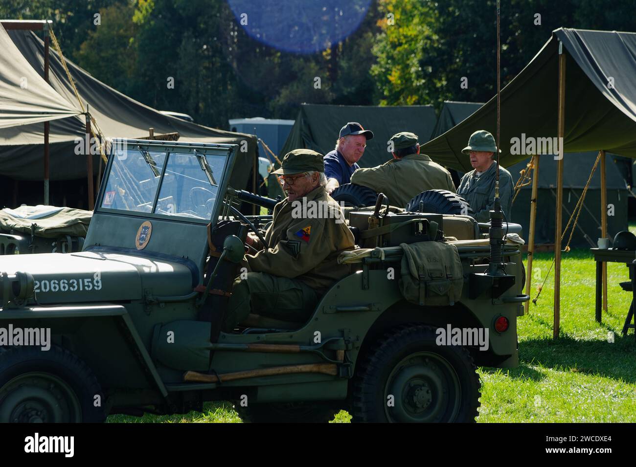2023 American Heritage Museum Hudson, Massachusetts. A WWII reenactment soldier sits in an