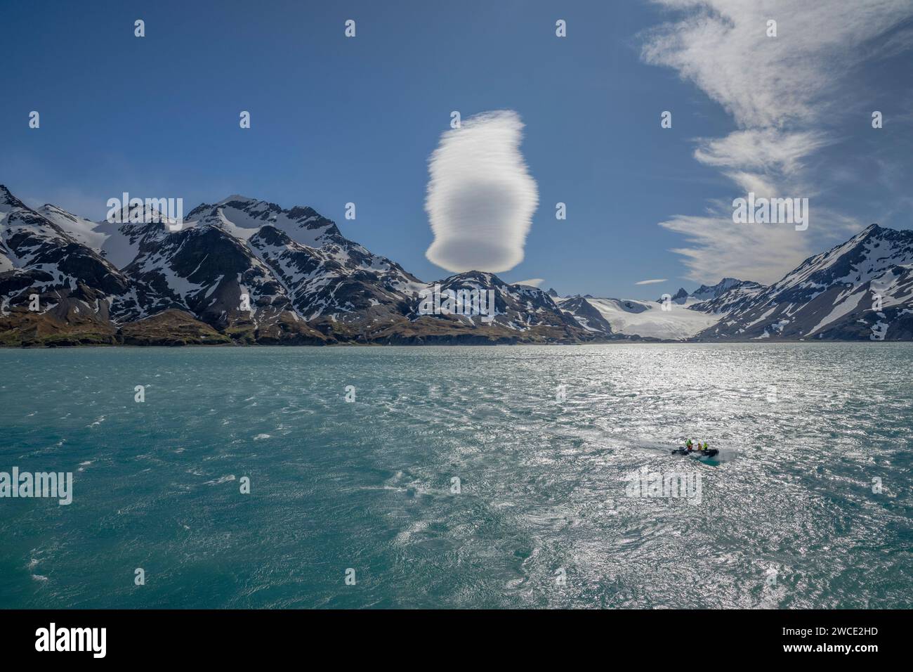 Rosita Harbor cloud sitting on mountain peak, stacked lenticular formation unusual and beautiful, constantly changing Stock Photo