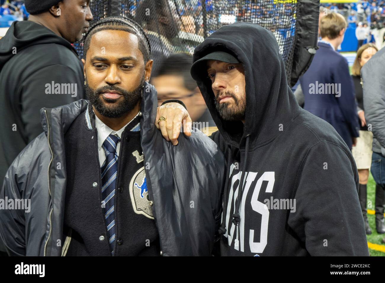 DETROIT, MI - JANUARY 14: Eminem and Big Sean pause for a photo before the game between Los Angeles Rams and Detroit Lions on January 14, 2024 at Ford Field in Detroit, MI (Photo by Allan Dranberg/CSM) Stock Photo