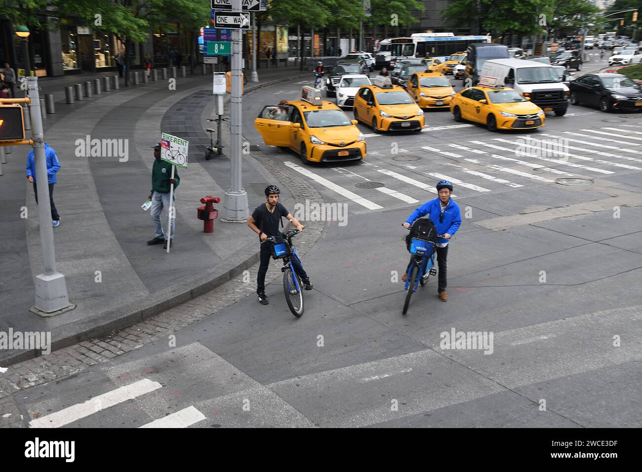 NEW YORK CITY /NEW YORK / USA 07.JUNE 2018 American bikers and yellow cas and heavy transportation in New York City. . Photo.Francis Joseph Dean / Deanpictures. Stock Photo