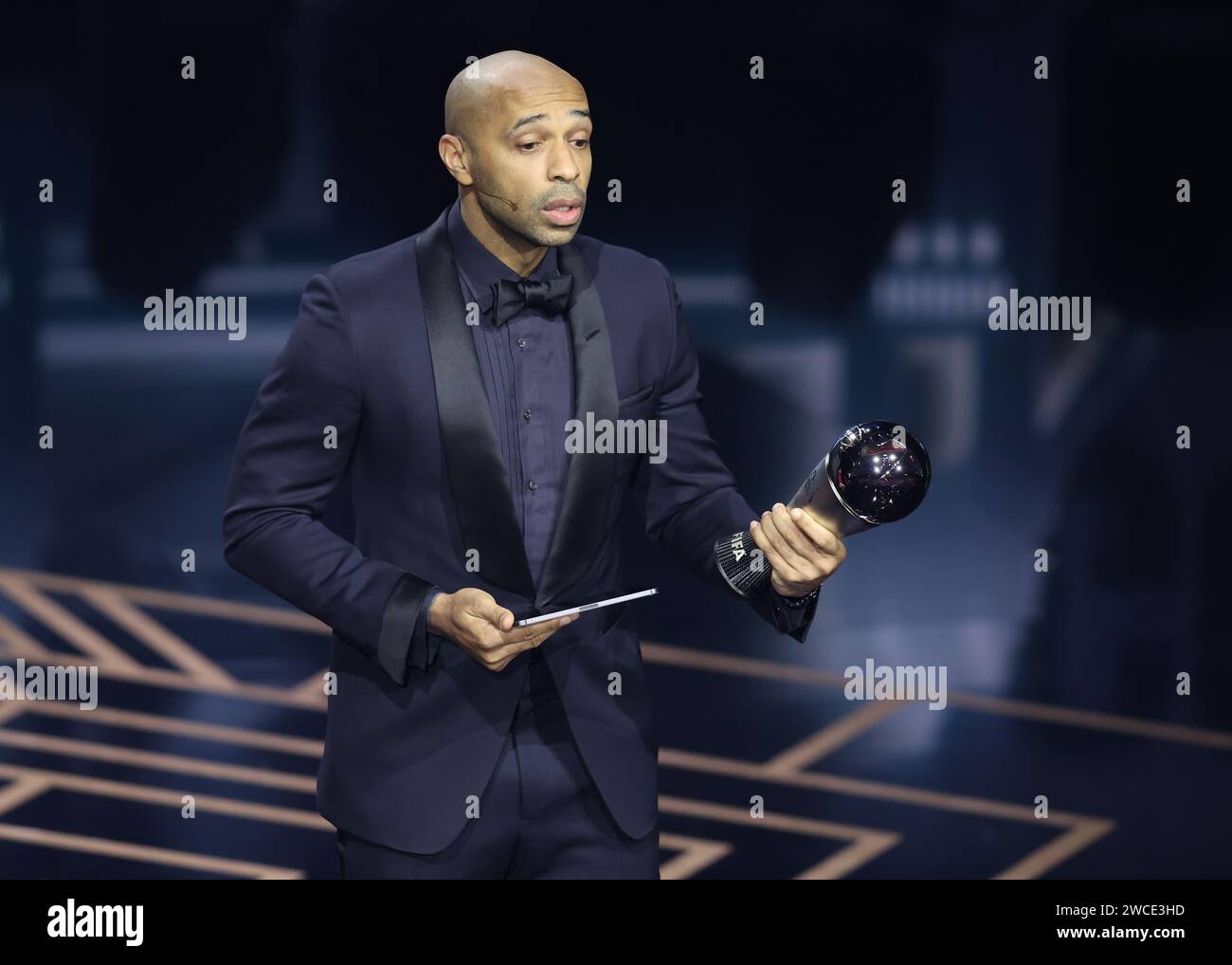 London, UK. 15th Jan, 2024. Thierry Henry collects the award on behalf