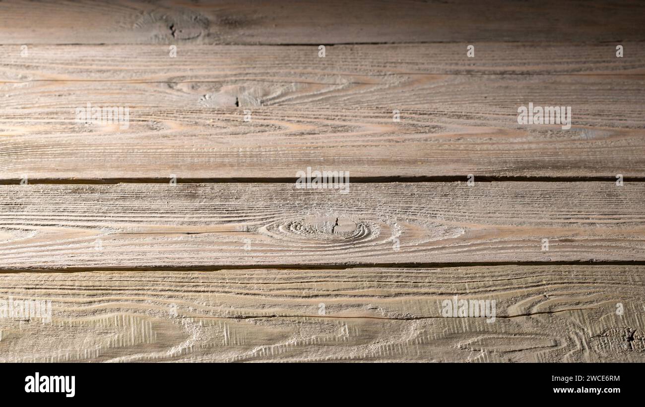 Close-up of weathered, rustic pine boards forming a gradient background ...
