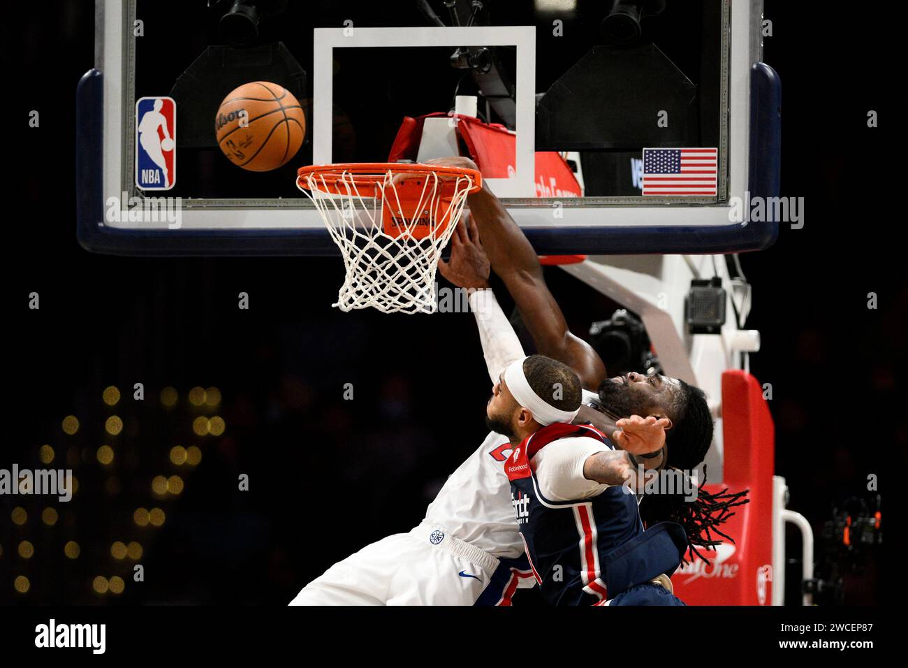 Washington Wizards center Daniel Gafford, front, and Detroit Pistons