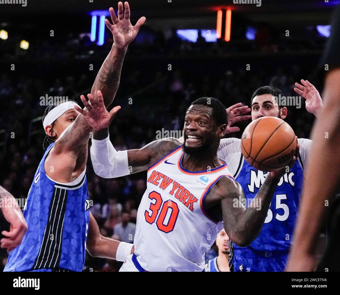 New York Knicks' Julius Randle (30) looks to pass the ball away from ...