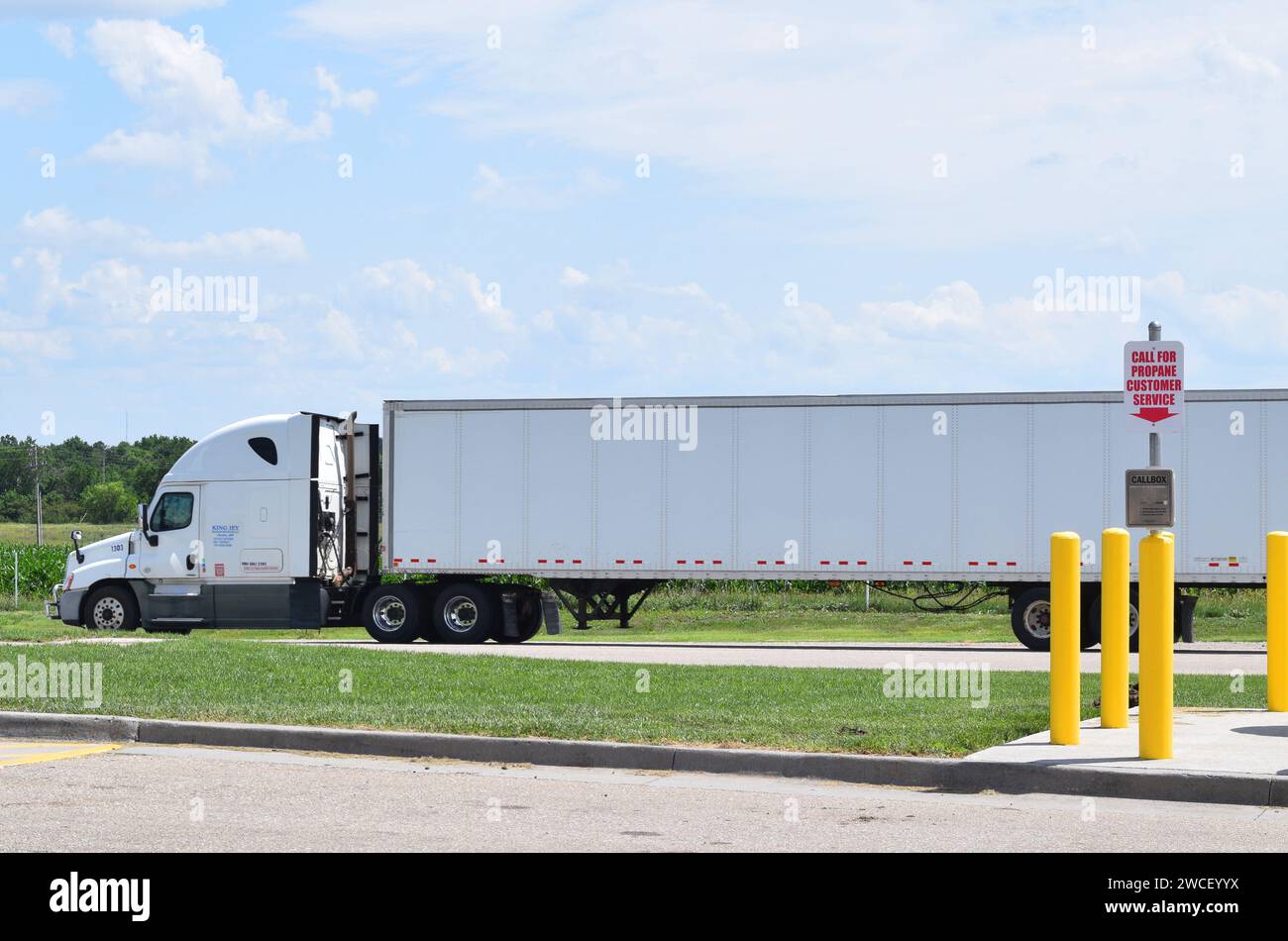 Semitruck exiting a Love's Truck Stop parking lot in Belleville, KS
