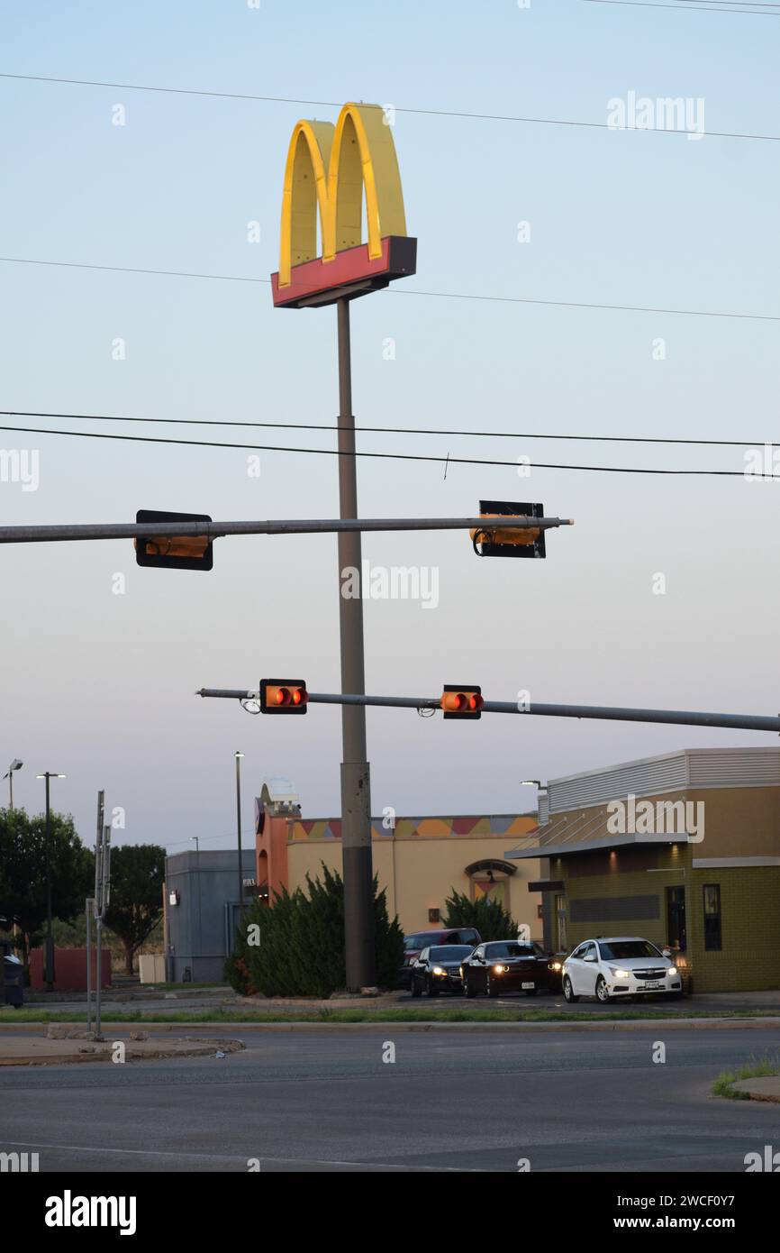 Busy McDonald's restaurant in the early evening of a summer day in
