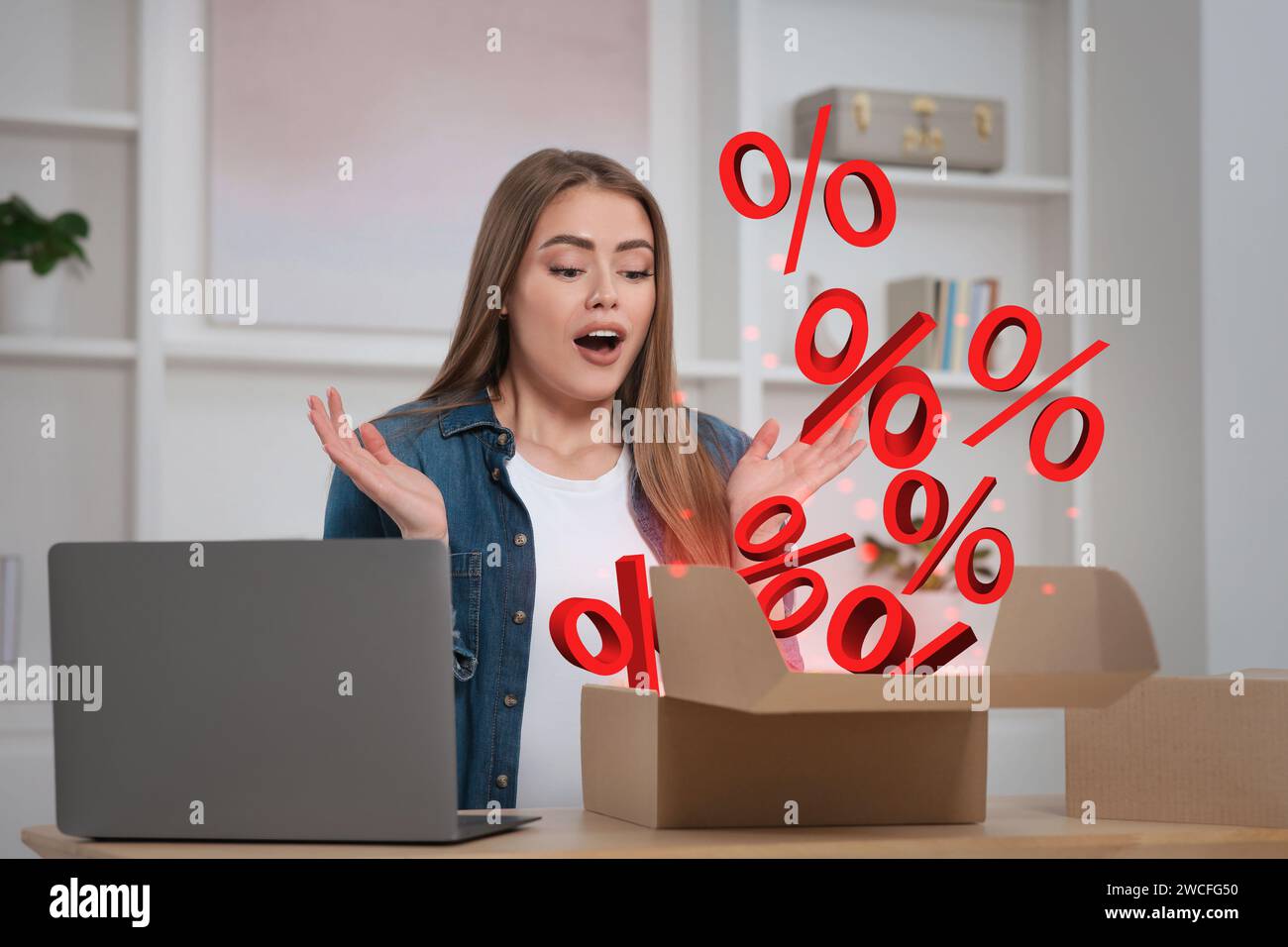 Discount offer. Woman shocked by percents signs flying out of open box at home Stock Photo