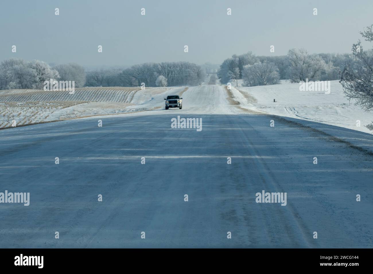 Albert Lea, Minnesota. Truck going down the road in a beautiful scenic