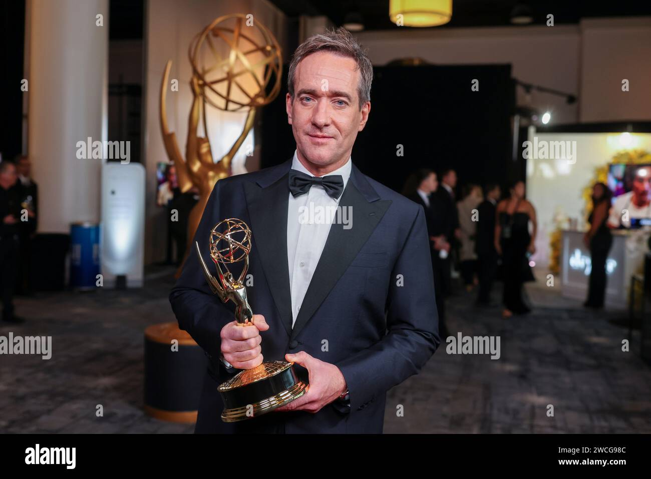 Matthew Macfadyen picks up their official Emmy statuette for