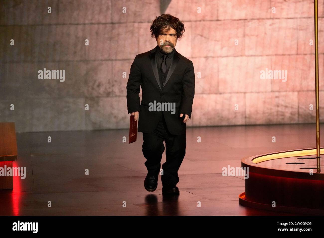 Peter Dinklage presents the award for outstanding drama series during