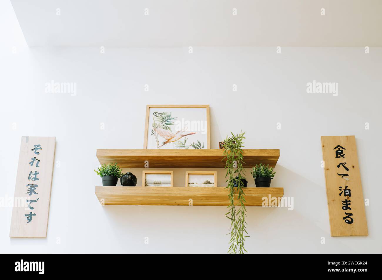 Wooden shelves on the white wall with the block of woods Stock Photo ...