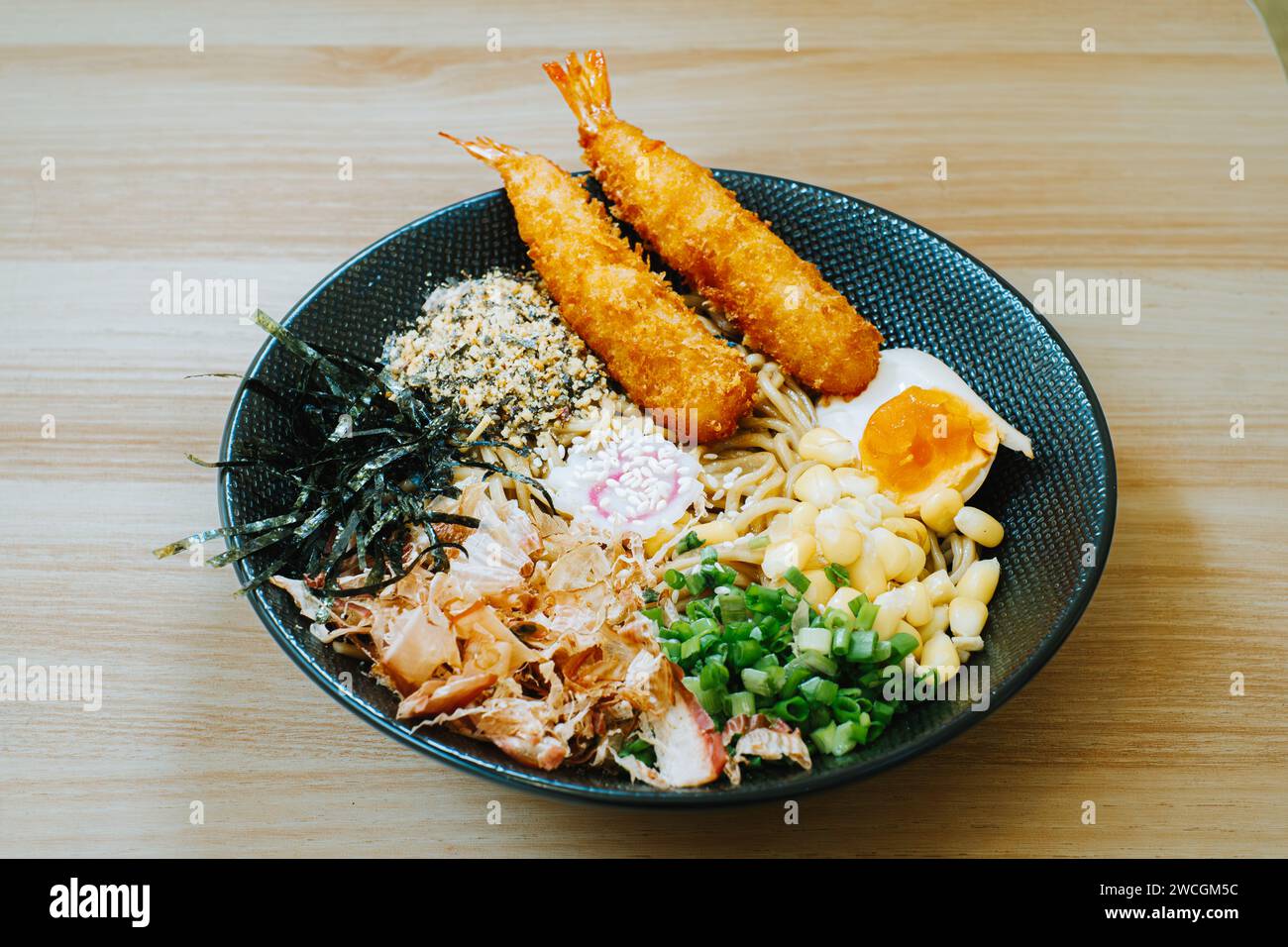 Dried Yaki Ramen with egg, a pile of nori, corns, leeks, Skipjack Tuna