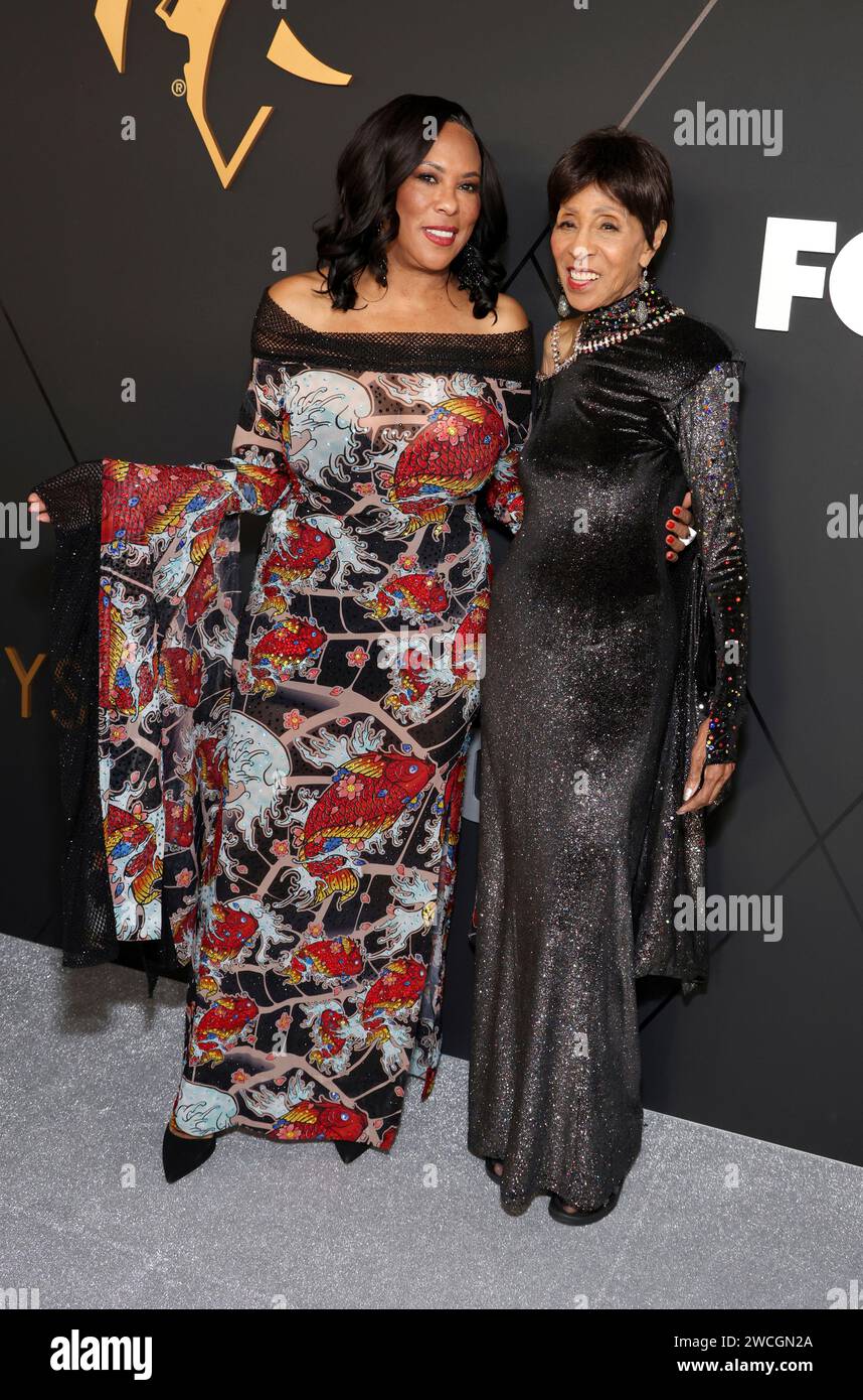 Marla Gibbs, right, walks the red carpet at the 75th Emmy Awards on