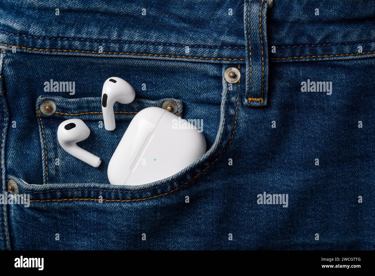 Antalya, Turkey - January 15, 2024: White wireless headphones Apple AirPods 3 Stock Photo
