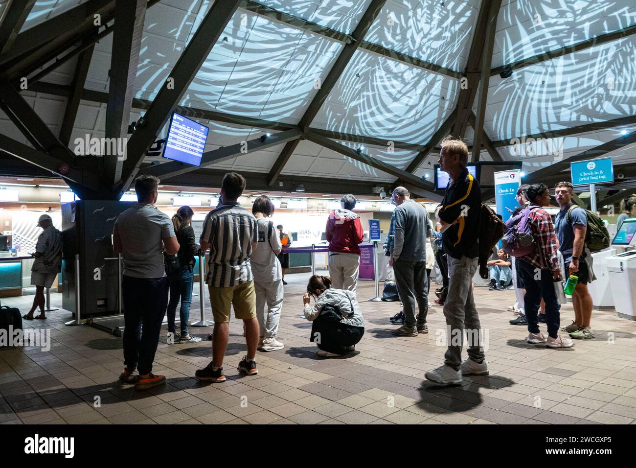 KailuaKona, Hawaii, USA. 15th Jan, 2024. Passengers stand outside of