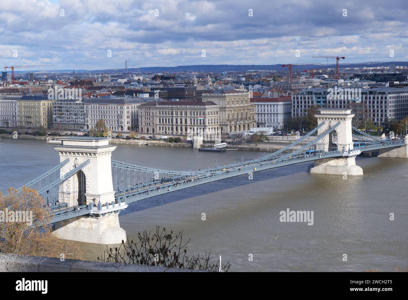 Impressive Budapest Bridge spanning the Danube River: An iconic architectural masterpiece connecting Buda and Pest, adorned with intricate details aga Stock Photo