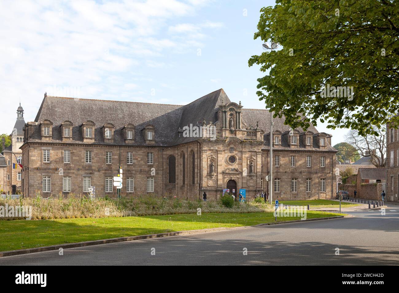 Guingamp, France - May 04 2022: The town hall of Guingamp is a former monastery belonging to the Augustinian Sisters of the Mercy of Jesus. Stock Photo