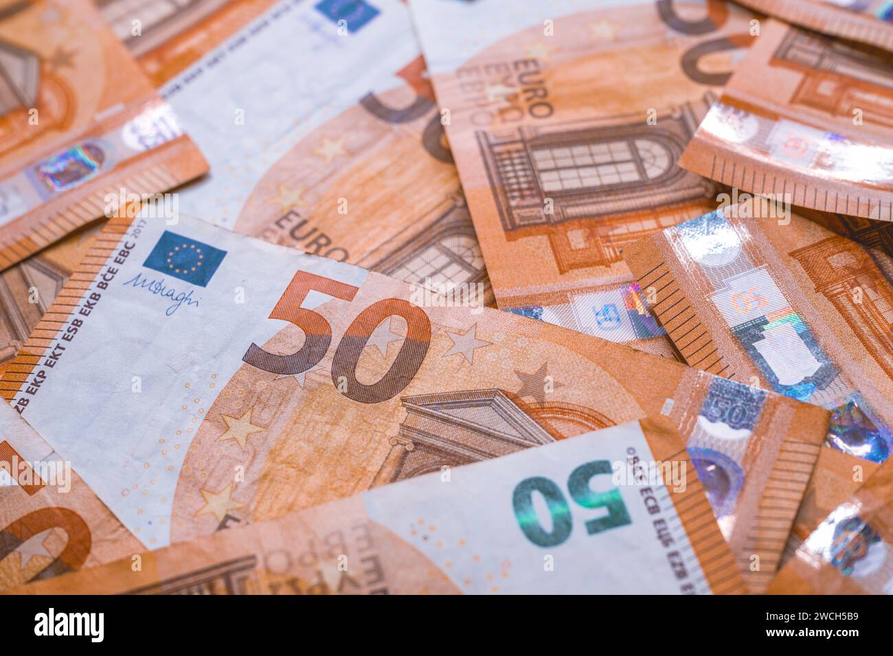 Pile of fifty euro banknotes, business and finance concept Stock Photo