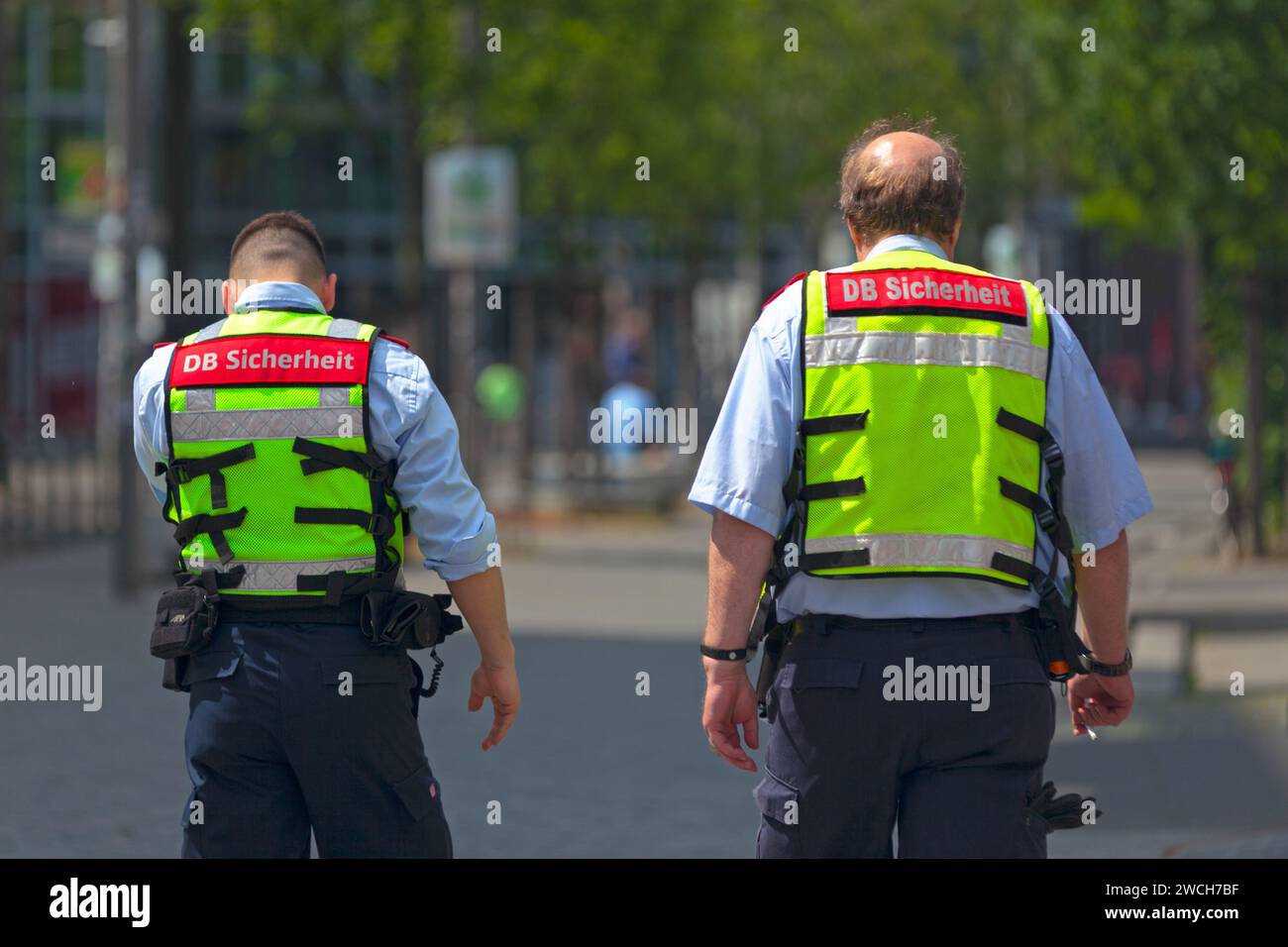 Berlin, Germany - June 01 2019: Two employees of DB Sicherheit (DB security) patrolling outside of Hackescher Markt Station. Stock Photo