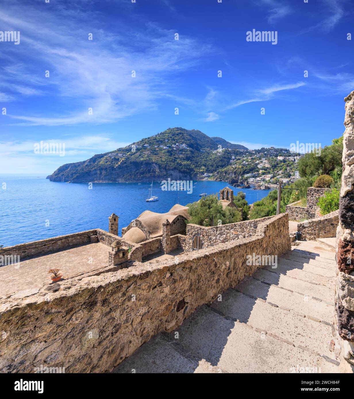 View of Ischia Island from a evocative staircase on Aragonese Castle in Italy. Stock Photo