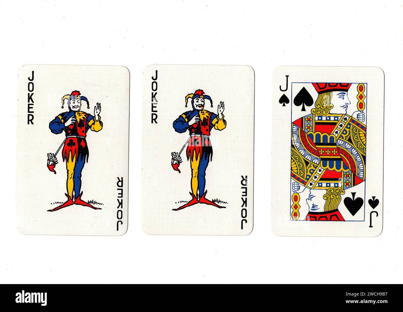 Vintage playing cards showing a pair of jokers and a black jack