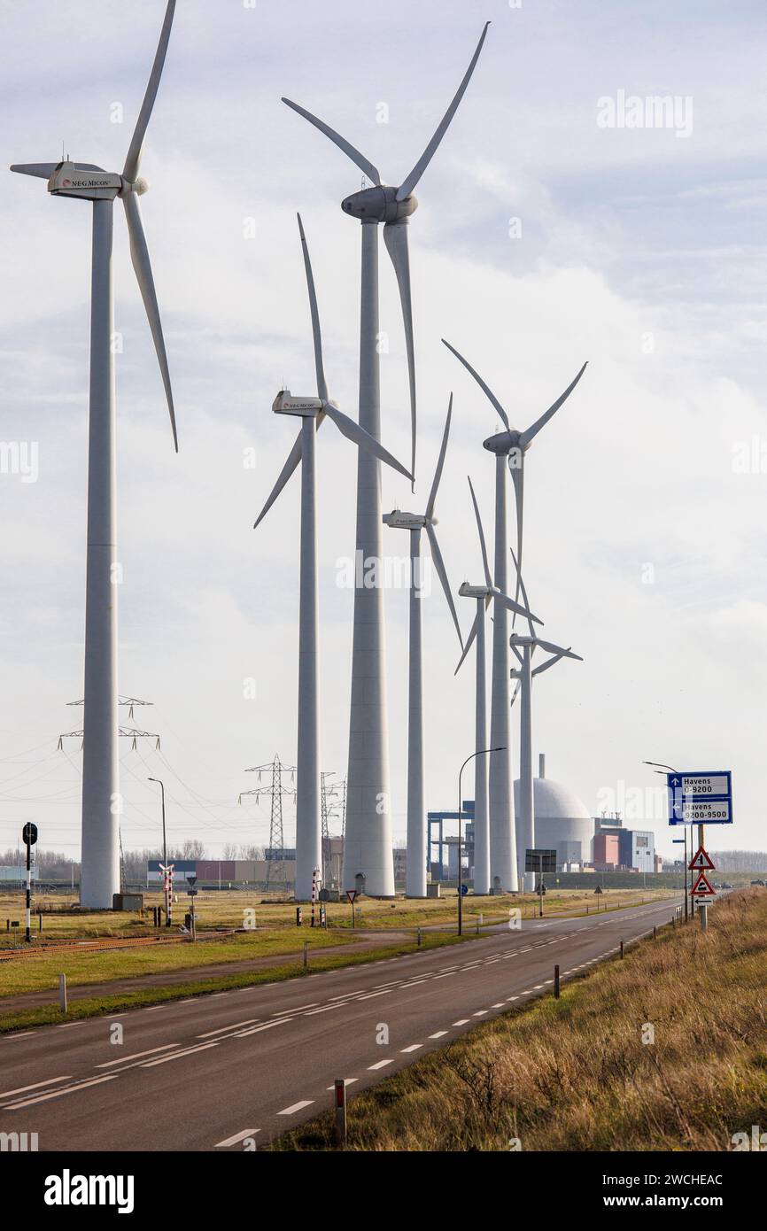 wind turbines at the port of Vlissingen, in the background the nuclear power station Borssele, Walcheren, Zeeland, Netherlands.  Windraeder im Hafen v Stock Photo
