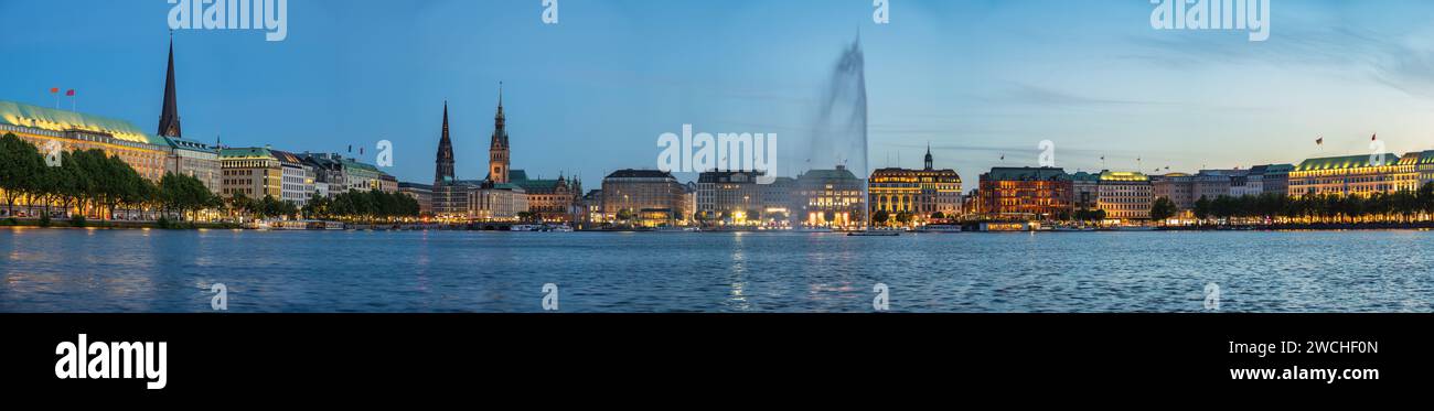 Hamburg Germany, panorama night city skyline at Alster Lake with Fountain Stock Photo