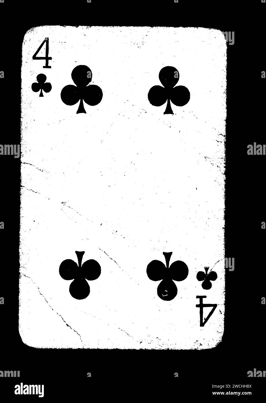 A vintage four of clubs playing card isolated on a black background