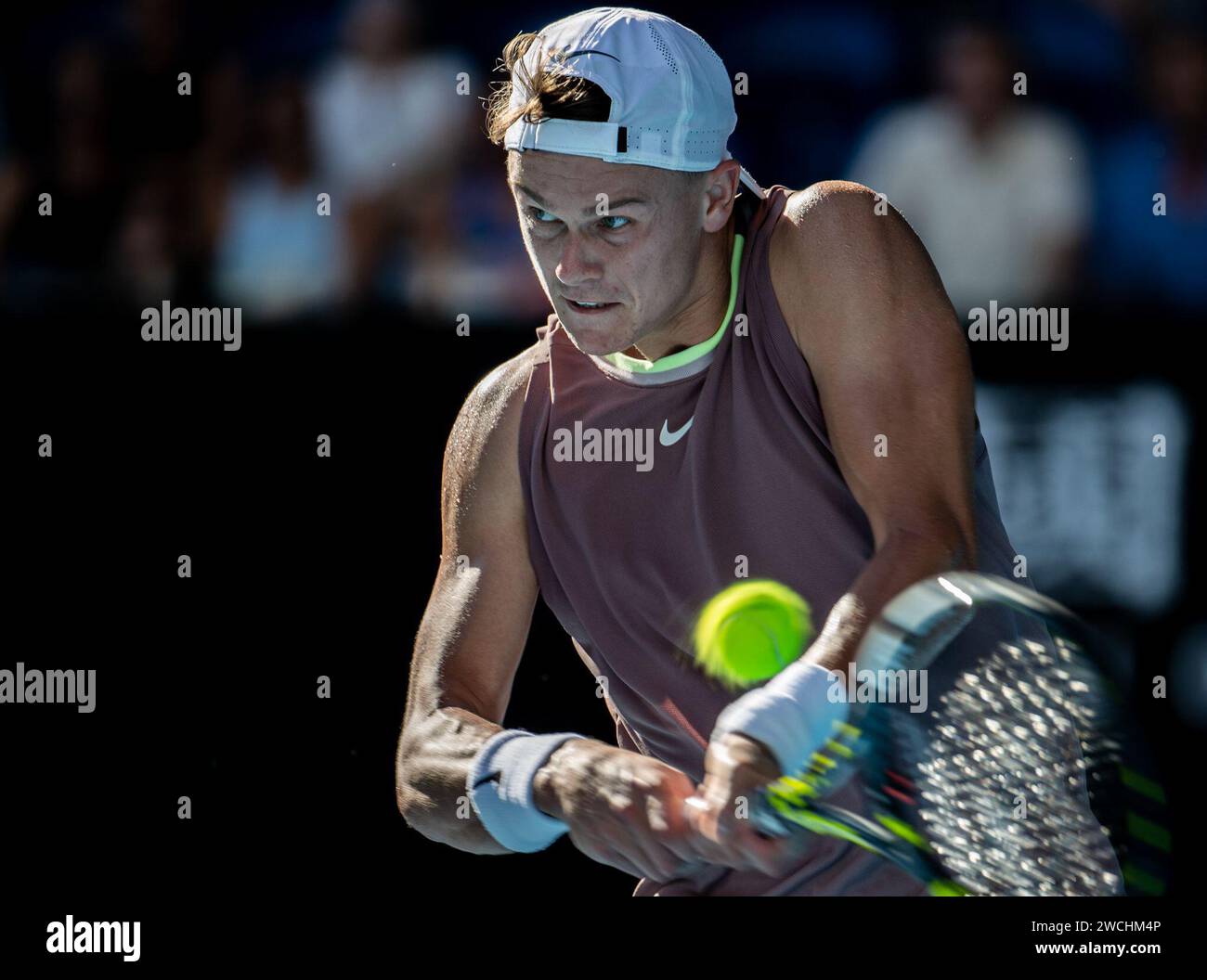 Melbourne, Australia. 16th Jan, 2024. Holger Rune of Denmark hits a ...