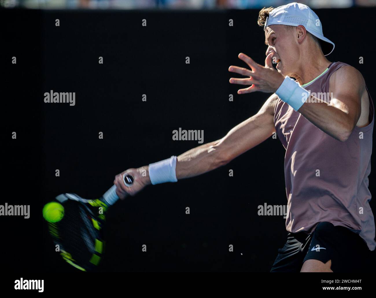 Melbourne, Australia. 16th Jan, 2024. Holger Rune of Denmark hits a ...