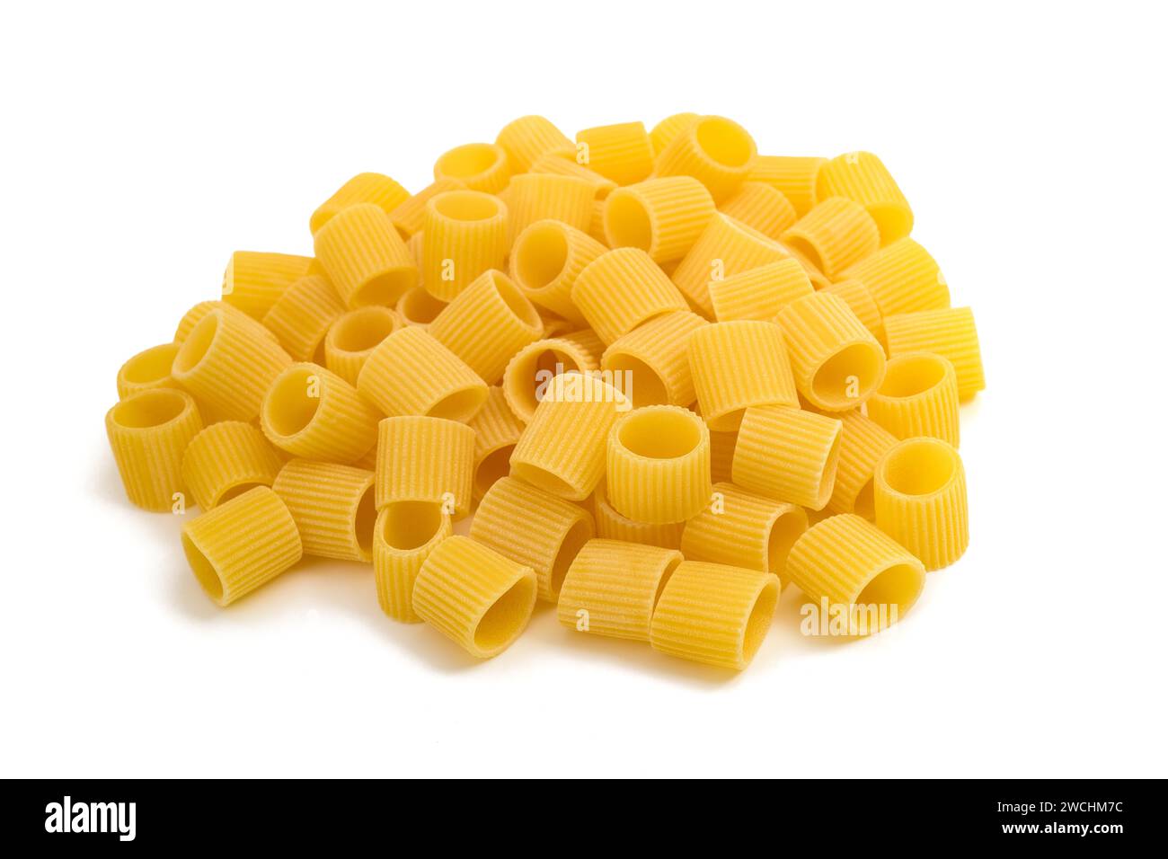 Mezze maniche pasta pile isolated on white background Stock Photo