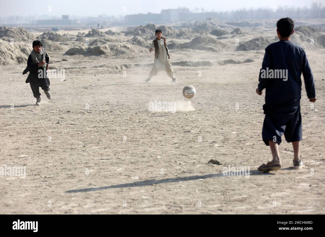 (240116) -- KABUL, Jan. 16, 2024 (Xinhua) -- Afghan boys play football