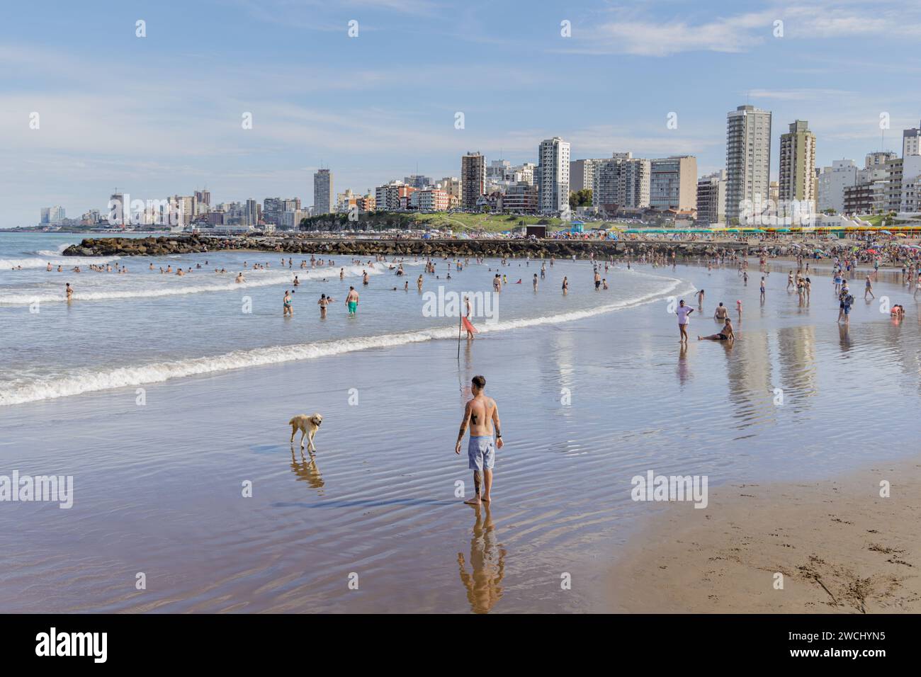 Mar del Plata, Argentina - January 15th, 2024: Tourists enjoy the sea at Stella Maris beach in Mar del Plata. Stock Photo