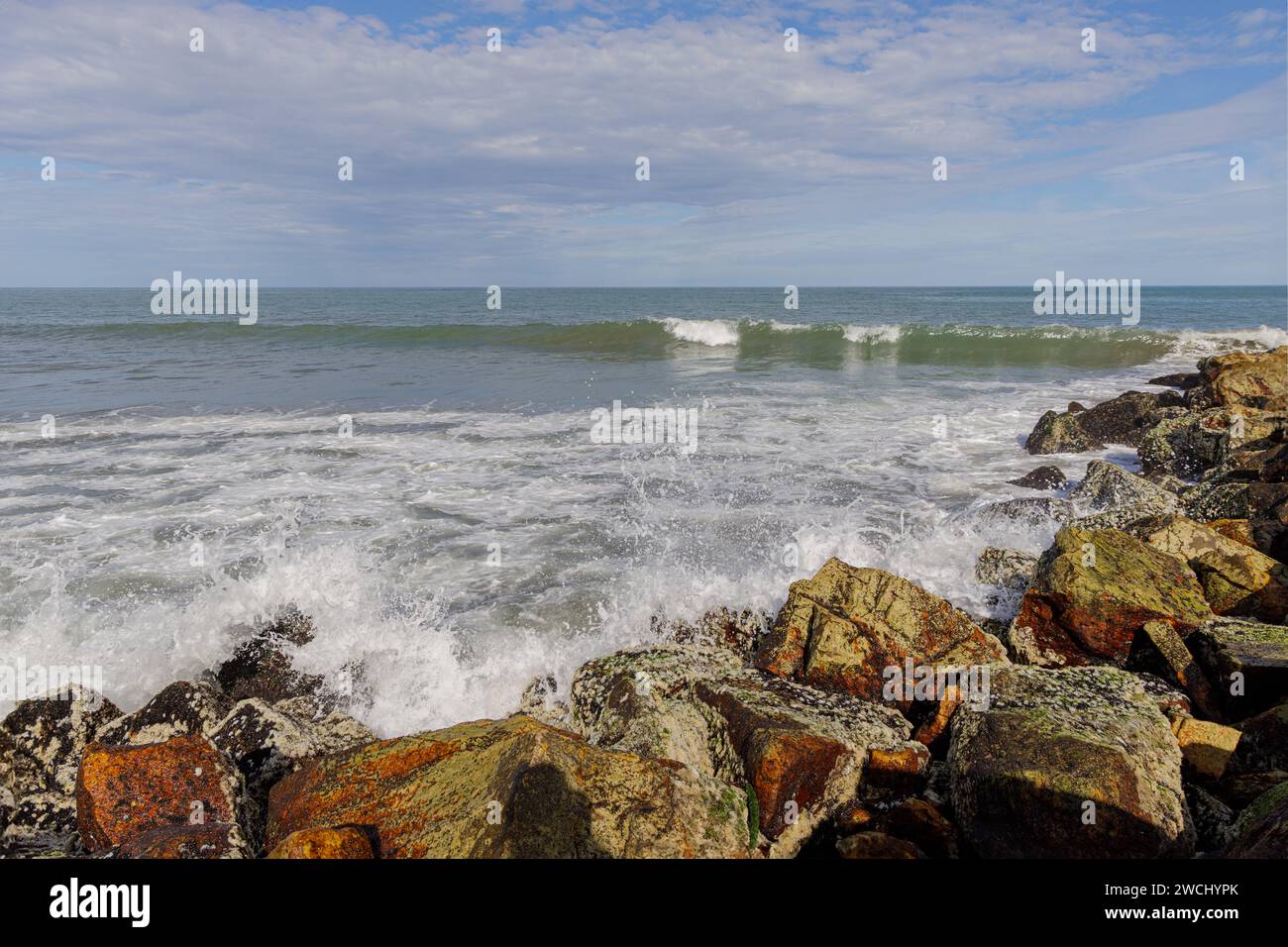 Waves crashing against the rocks on the coast. Stock Photo