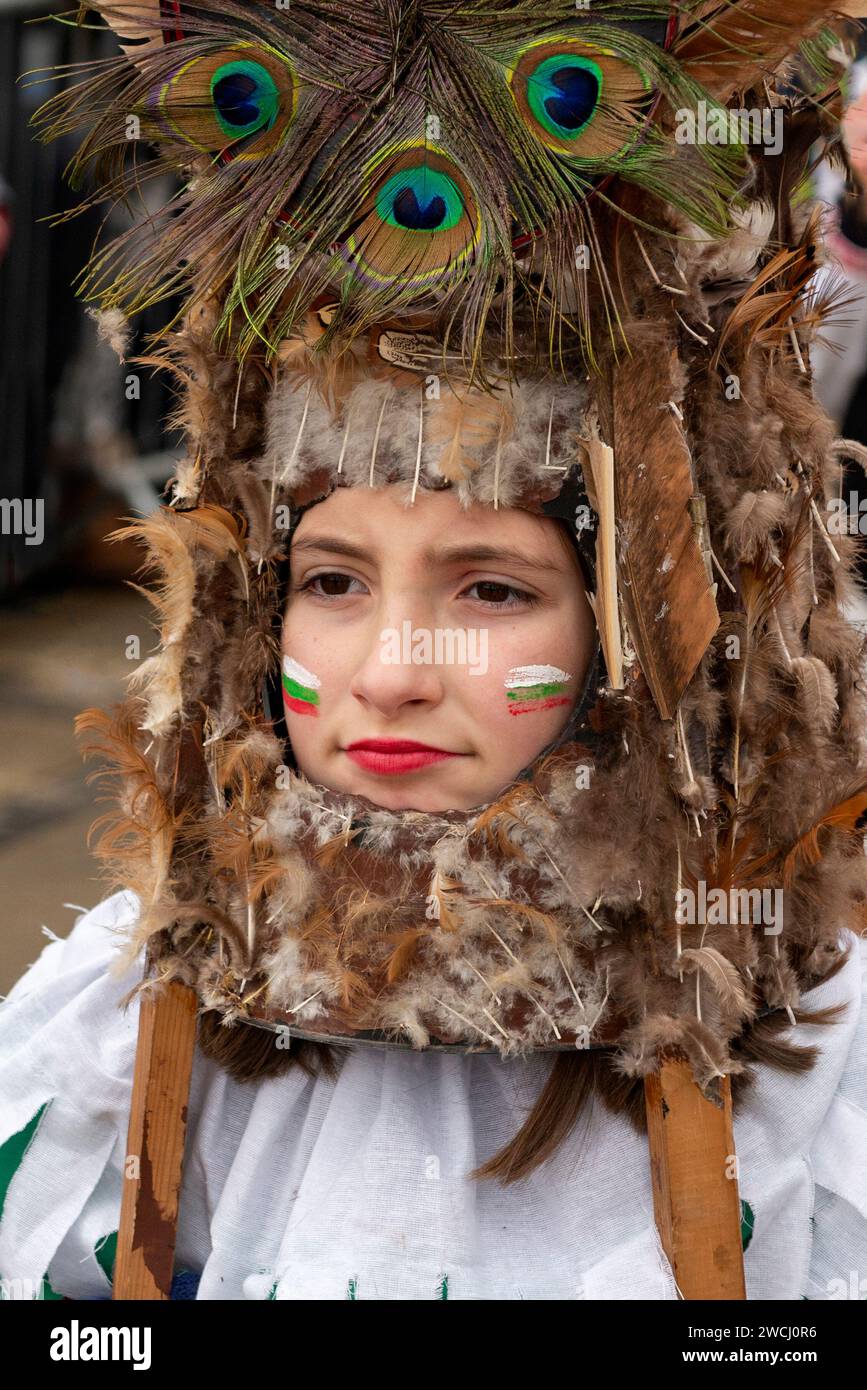 Child with intricate mask at the Surva International Masquerade and Mummers Festival in Pernik, Sofia Region, Bulgaria, Eastern Europe, Balkans, EU Stock Photo