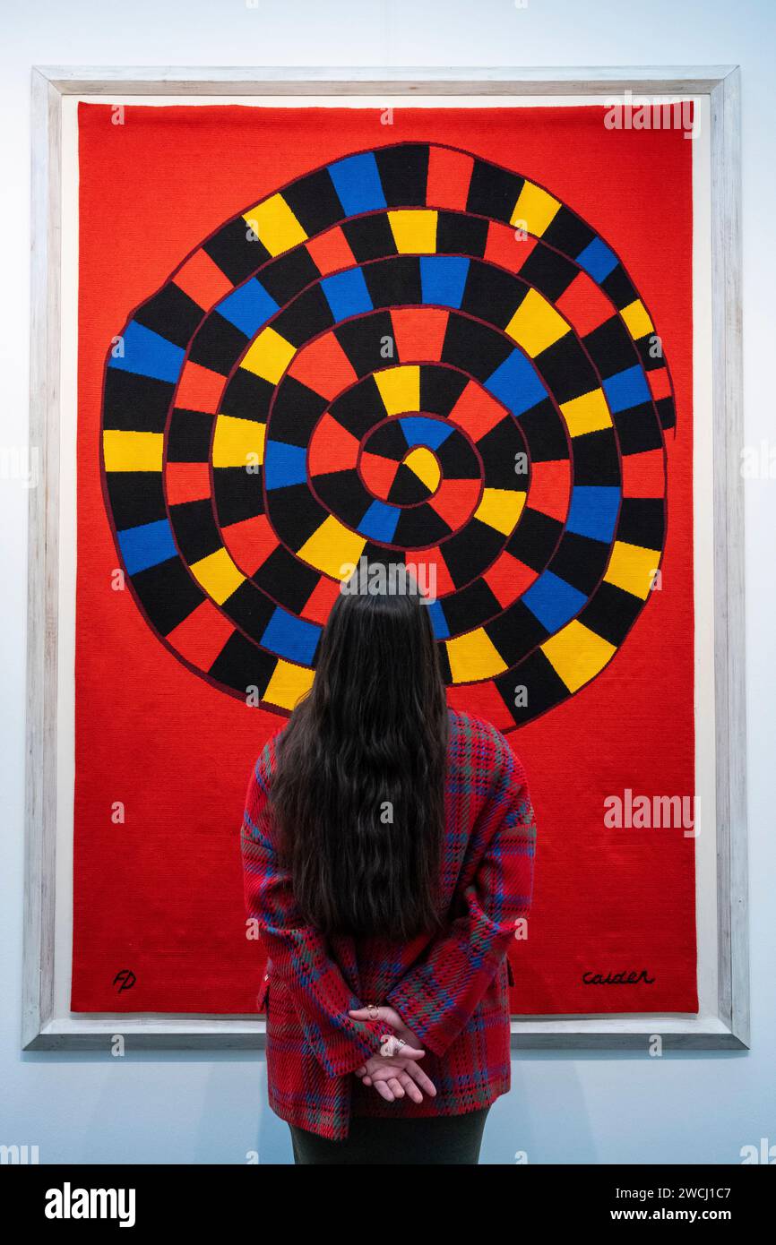 London, UK. 16 January 2024. A staff member with 'Serpent au Vitral