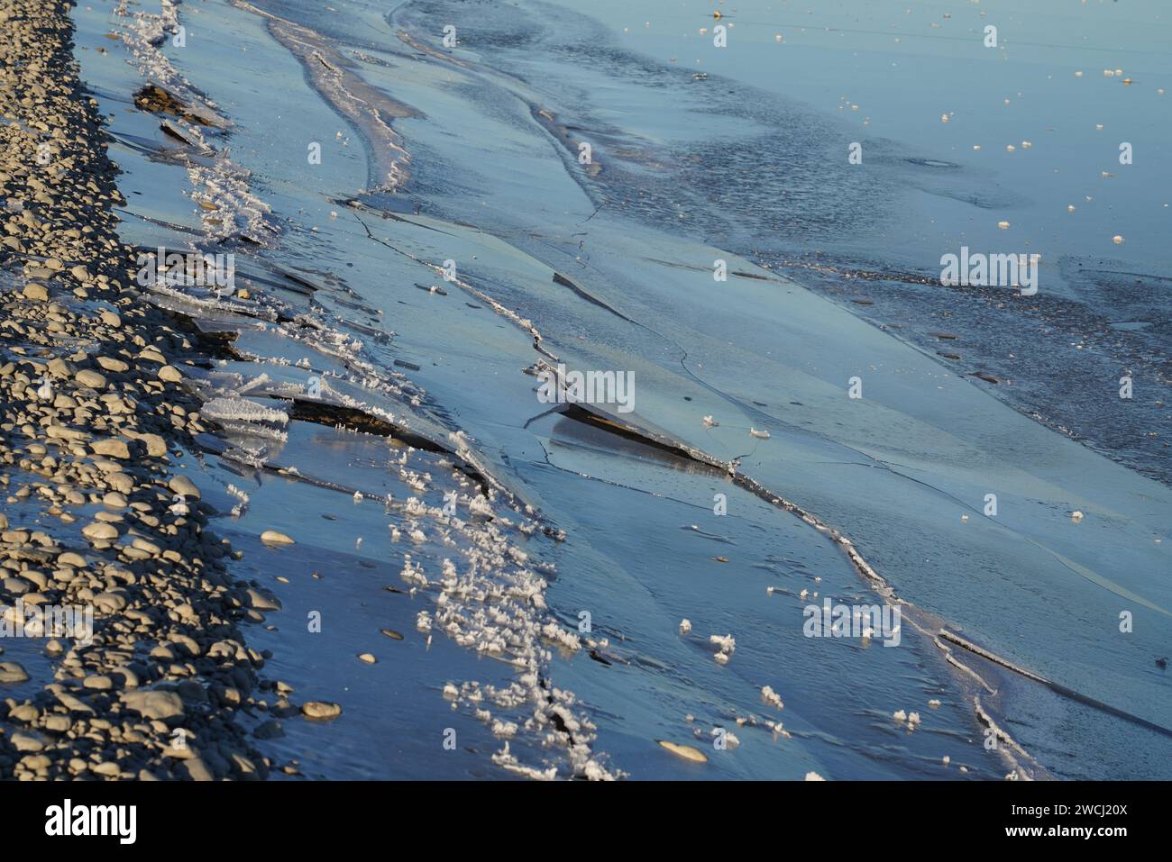 Winter landscape at an icy lake. Stock Photo