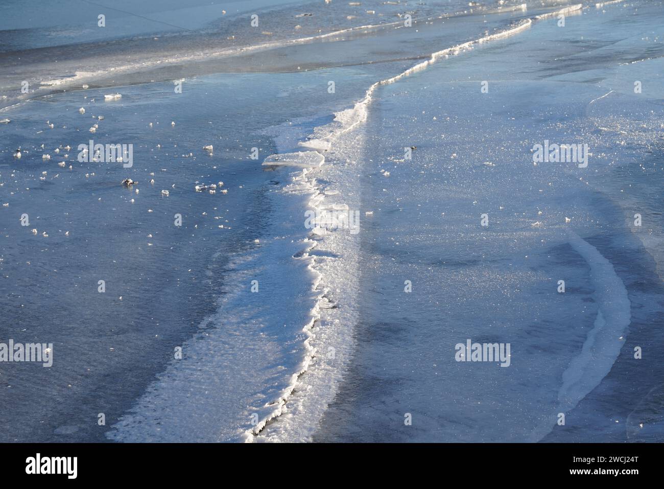 Winter landscape at an icy lake. Stock Photo