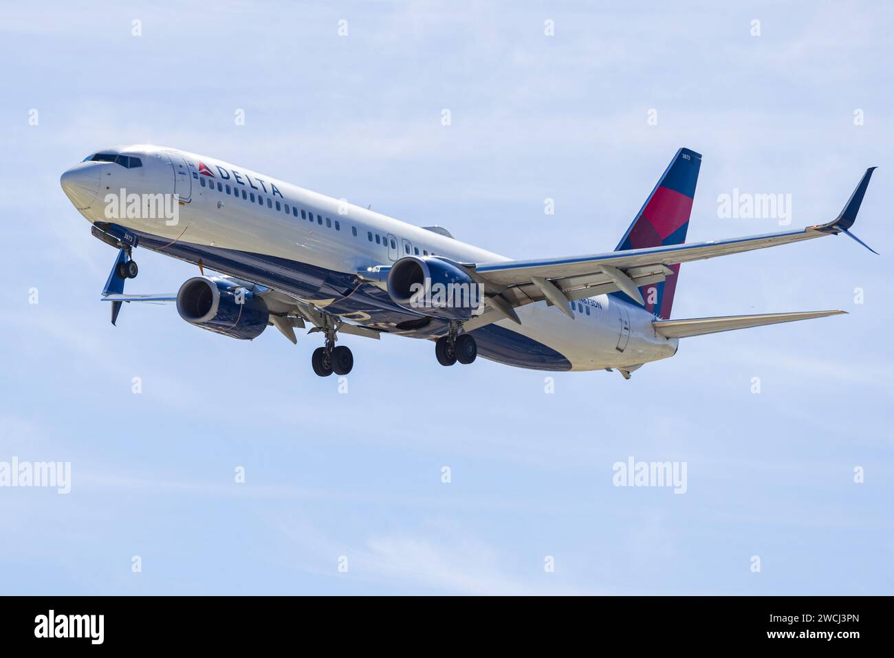 N873DN Delta Air Lines Boeing 737-932ER(WL) landing at Palm Springs (PSP/KPSP) Stock Photo
