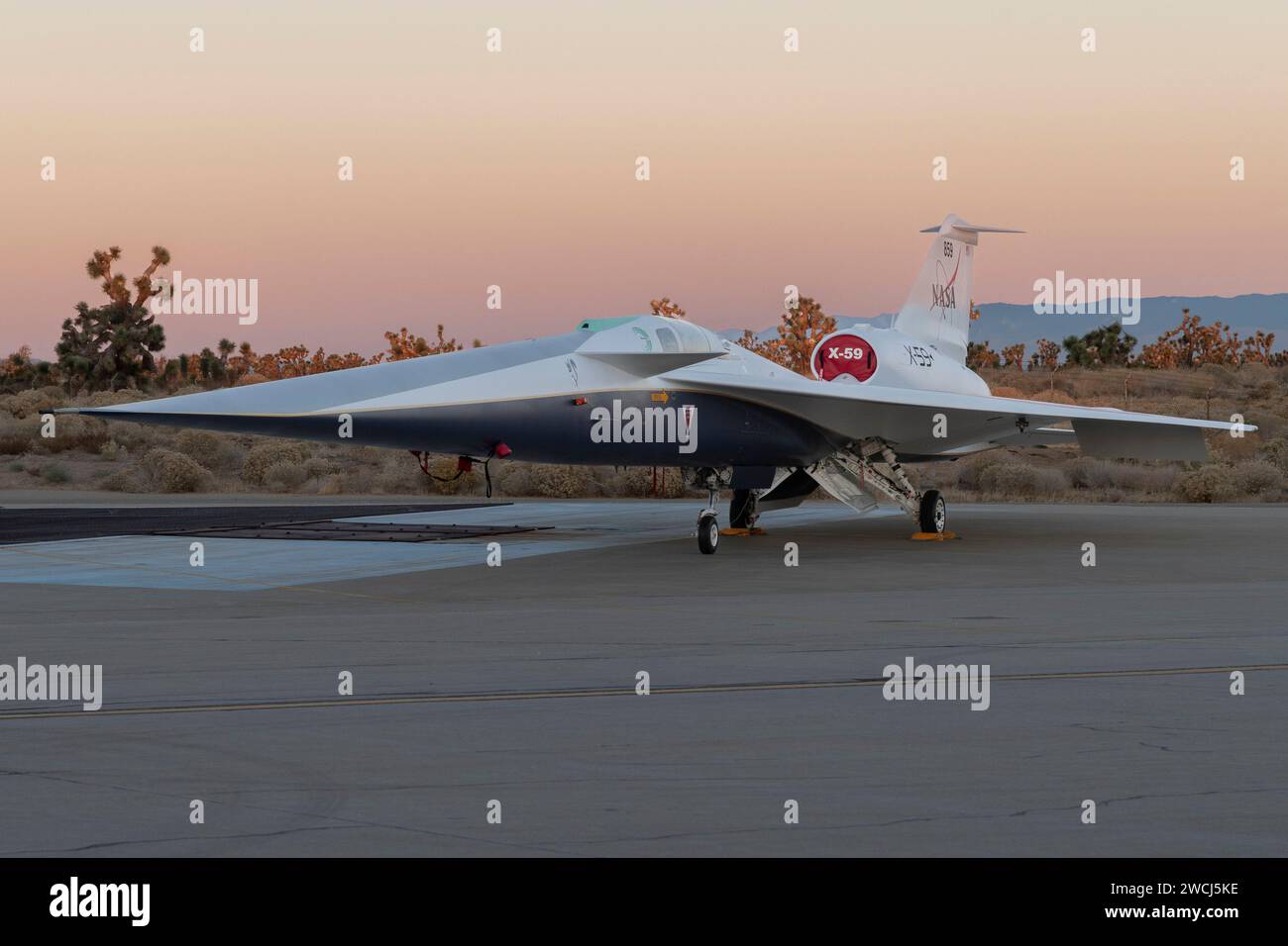 NASA's X-59 quiet supersonic research aircraft, pictured on December 12, 2023, sits on the apron outside Lockheed Martin's Skunk Works facility in Palmdale, California. NASA and Lockheed Martin formally debuted the one-of-a-kind experimental airplane on Friday, January 12, 2024. The X-59 is the centerpiece of NASA's Quesst mission, which seeks to address one of the primary challenges to supersonic flight over land by making sonic booms quieter. NASA Photo by Steve Freeman/UPI Stock Photo