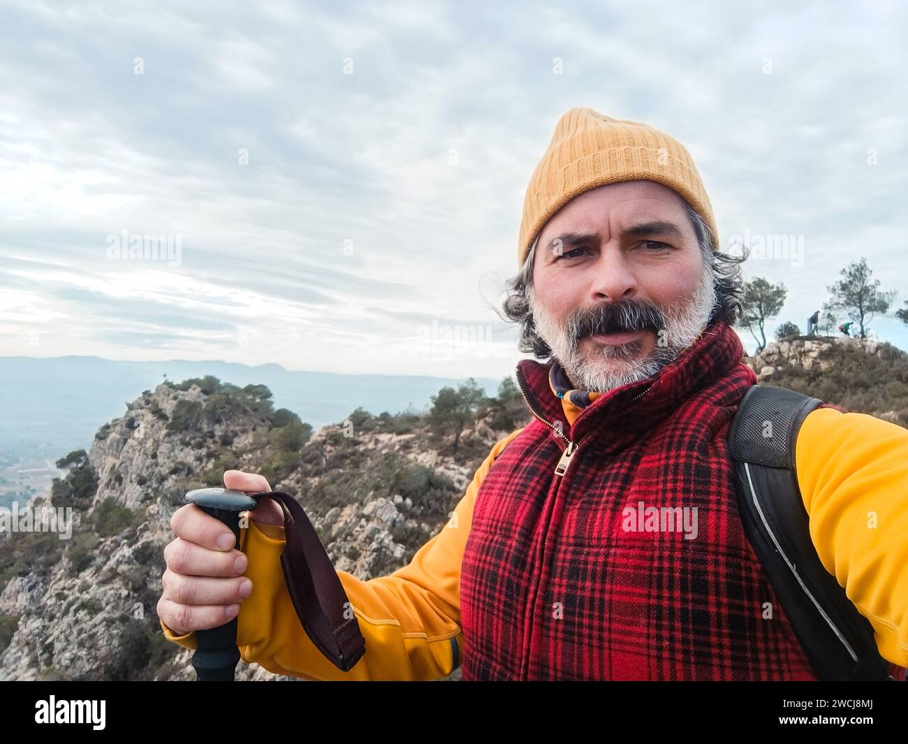 Man atop mountain hi-res stock photography and images - Alamy