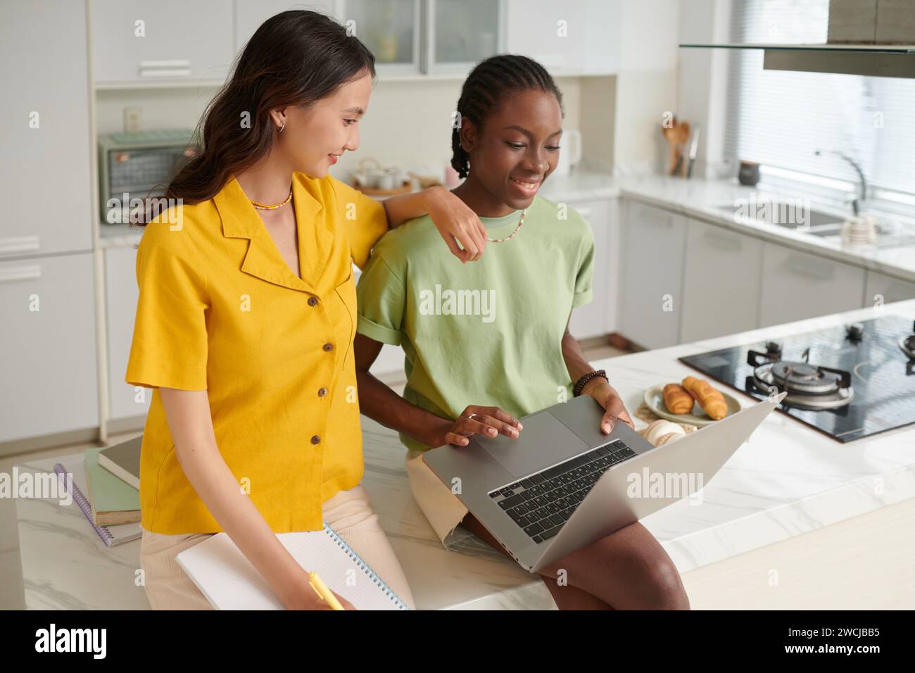 Computer science students doing homework Stock Photo - Alamy