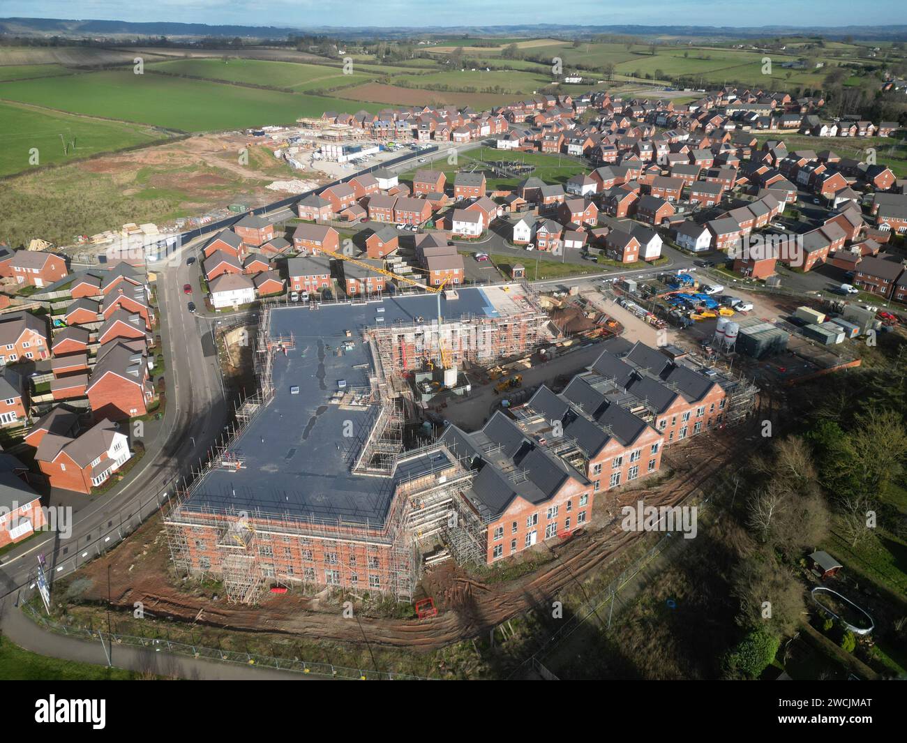 Aerial view of new retirement village housing development ( centre ) by
