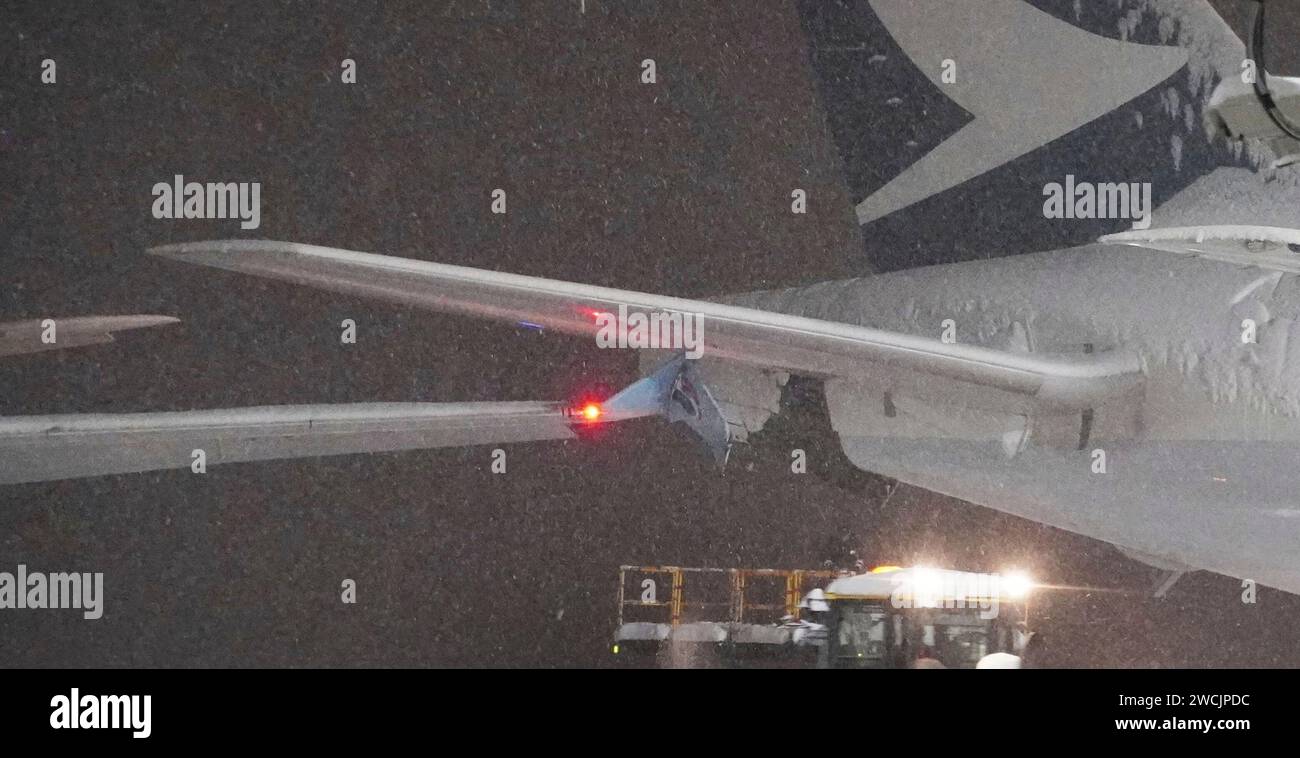 A part of wing of a Korean Air plane, left, and Cathay Pacific aircraft